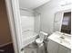 Bathroom featuring tile flooring, toilet, tub/shower and sink with vanity at 6221 Tributary Dr, Raleigh, NC 27609