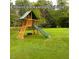 Backyard features a wooden playset, perfect for children to play at 69 White Azalea Way, Homesite 81, Benson, NC 27504