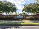 Charming entrance to the community with manicured landscaping and decorative brickwork at 730 Toms Creek Rd, Cary, NC 27519