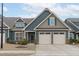 Charming two-car garage home with stone accents, neutral colors, and inviting curb appeal at 74 Powderhorn Pt, Garner, NC 27529