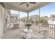 Relaxing screened porch with wicker furniture and views of the backyard at 74 Powderhorn Pt, Garner, NC 27529