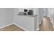 Modern kitchen with granite counters, stainless appliances, and open floor plan at 8415 Reedy Ridge Ln, Raleigh, NC 27613