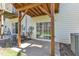 A ground level patio offers outdoor space with sliding door access to the home's interior at 8415 Reedy Ridge Ln, Raleigh, NC 27613
