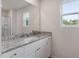Bathroom with granite countertop vanity, large mirror and glass enclosed shower at 903 Rhino Bnd, Oxford, NC 27565