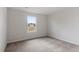 New carpeted bedroom with a bright window providing ample natural light and neutral-colored walls at 903 Rhino Bnd, Oxford, NC 27565