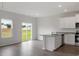 Modern kitchen featuring stainless steel appliances, granite counters, and a center island at 903 Rhino Bnd, Oxford, NC 27565