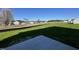 This property features a view of a large, green backyard with construction in the distance at 91 Lotus Ave, Smithfield, NC 27577