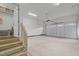Spacious two-car garage includes storage and access to the home at 112 Pointe Park Cir, Holly Springs, NC 27540