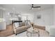 Open living space with a kitchen and dining area in background at 112 Pointe Park Cir, Holly Springs, NC 27540
