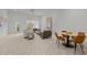 Spacious living room with neutral carpet, recessed lighting, and comfortable seating area at 112 Pointe Park Cir, Holly Springs, NC 27540