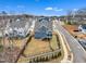 A picturesque backyard with a fenced yard, featuring a patio and lush green grass for outdoor enjoyment at 112 Sire Ct, Holly Springs, NC 27540
