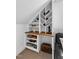 Close up of the bonus room showcasing the custom shelving and bonus seating at 112 Sire Ct, Holly Springs, NC 27540