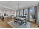 Elegant dining room with hardwood floors and connecting view to kitchen at 112 Sire Ct, Holly Springs, NC 27540