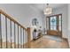 Bright foyer featuring a stylish console table and decorative mirror at 112 Sire Ct, Holly Springs, NC 27540