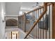 Loft with modern railings, a brown beanbag and furniture in the bonus room at 112 Sire Ct, Holly Springs, NC 27540