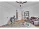 Well-lit office featuring wood floors, an exterior view and a leather chair at 112 Sire Ct, Holly Springs, NC 27540