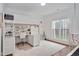 Charming bedroom with a built-in loft bed, a cozy desk area, and a bright, inviting atmosphere at 1124 Westridge Rd, Rougemont, NC 27572