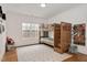Bedroom with built in bunk beds, gray and white rug and large window providing ample natural light at 1124 Westridge Rd, Rougemont, NC 27572