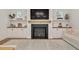 Beautiful fireplace with shiplap and built-in shelving in a well-lit living room at 1124 Westridge Rd, Rougemont, NC 27572