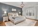 Cozy main bedroom with a comfortable king bed and decorative accents at 1124 Westridge Rd, Rougemont, NC 27572