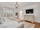 Bright main bedroom with a dresser and large window at 1124 Westridge Rd, Rougemont, NC 27572