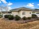 Home exterior featuring manicured landscaping and a well-maintained backyard at 12 Stonegate Dr, Angier, NC 27501