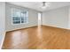 Bedroom featuring neutral paint, laminate flooring, and a ceiling fan at 12 Stonegate Dr, Angier, NC 27501