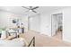 Versatile bonus room perfect for a second living area or home office with neutral colored carpet at 1201 Canary Pepper Dr, Durham, NC 27713