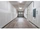 Spacious garage with overhead lighting and a door leading to the interior of the home at 1201 Canary Pepper Dr, Durham, NC 27713