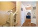 Hallway leading to a living room with a fireplace at 121 Westview Dr # 106, Carrboro, NC 27510