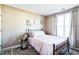 Comfortable bedroom featuring a full sized bed, neutral decor, and natural light at 124 Kipling Dr, Oxford, NC 27565
