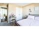Bright bedroom with a bed, vanity, and closet door at 124 Kipling Dr, Oxford, NC 27565