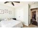 Inviting bedroom with a ceiling fan, closet space, and natural light creates a welcoming space at 124 Kipling Dr, Oxford, NC 27565