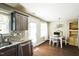 Bright breakfast nook with stainless steel appliances and access to the back yard at 124 Kipling Dr, Oxford, NC 27565