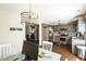 Open-concept kitchen with stainless appliances, granite counters, and seamless flow to living spaces at 124 Kipling Dr, Oxford, NC 27565