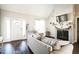 Open living room with a fireplace and a view of the front door at 124 Kipling Dr, Oxford, NC 27565