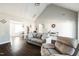 Bright living room with vaulted ceilings, wood floors, and neutral decor at 124 Kipling Dr, Oxford, NC 27565