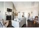 Cozy living room showcasing a fireplace with decorative mantle and ample seating space at 124 Kipling Dr, Oxford, NC 27565