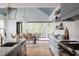 Dining room with a view featuring a seamless transition from the kitchen and access to the balcony, perfect for dining at 1421 Sky Vista Way, Raleigh, NC 27613