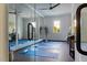 Bright exercise room with mirrors, yoga mats, and an abundance of natural light at 1421 Sky Vista Way, Raleigh, NC 27613
