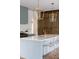 Elegant kitchen island with seating, stylish pendant lights, and top-of-the-line appliances create a chef's dream at 1421 Sky Vista Way, Raleigh, NC 27613