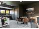 Entertainment room with a kitchenette, dining table and hardwood flooring at 1421 Sky Vista Way, Raleigh, NC 27613