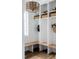 Bright mudroom with built-in cubbies, wooden benches, and stylish light fixture at 1421 Sky Vista Way, Raleigh, NC 27613