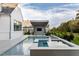 Beautiful backyard pool with a covered bar area, perfect for entertaining guests and enjoying outdoor living at 1421 Sky Vista Way, Raleigh, NC 27613