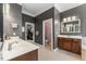 Bathroom features double sinks, vanity with storage, and a separate room for the toilet and walk-in closet at 1425 Princess Anne Rd, Cary, NC 27607