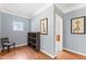 Bonus room with hardwood floors, a decorative chair and ample natural light at 1425 Princess Anne Rd, Cary, NC 27607
