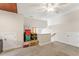Bonus room with carpeting, access to the attic, and ample storage at 1425 Princess Anne Rd, Cary, NC 27607
