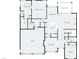 First-floor layout featuring the primary bedroom and bath, kitchen, living area, garage, and dining room at 1425 Princess Anne Rd, Cary, NC 27607