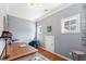 Bright home office with natural light, wooden floors, and a comfortable workspace at 1425 Princess Anne Rd, Cary, NC 27607