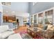 Open-concept living room with a seamless flow to the kitchen and dining area, perfect for entertaining at 1425 Princess Anne Rd, Cary, NC 27607